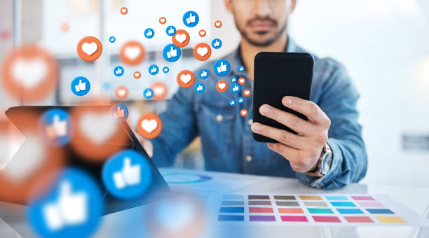 notification, phone and businessman on social media networking as communication with overlay or graphic like. digital, heart emoji and employee or worker texting on a mobile app, website or web - 移动数字营销 個照片及圖片檔